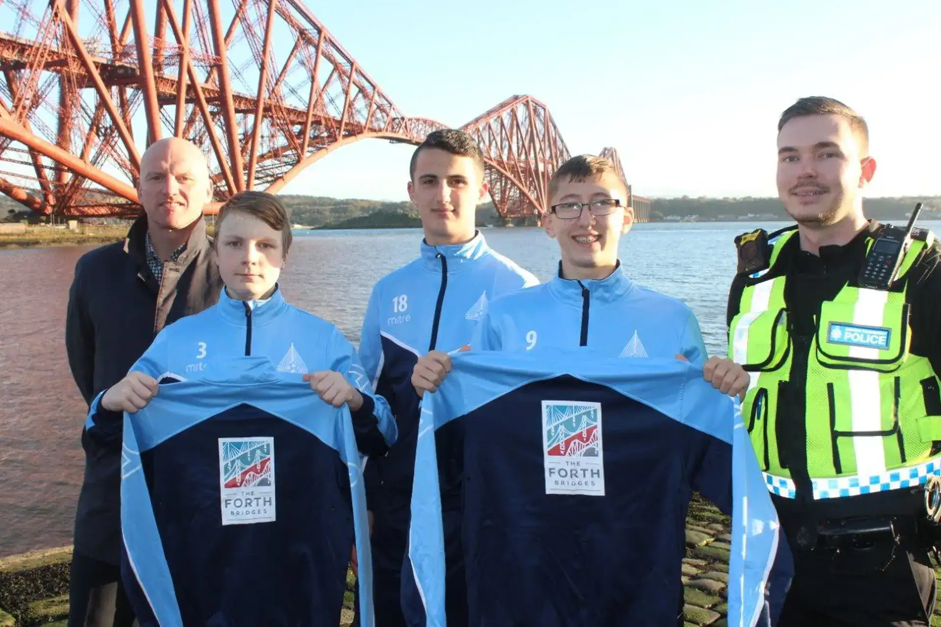 Background image - Nqfc Sponsorship L R Mark Henderson Michael Wynne Kieran Mitchell Joshua Spence And Pc Ross Millar