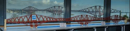 Photo | Lego model of Forth Bridge displayed against window with a view to the Forth Bridge