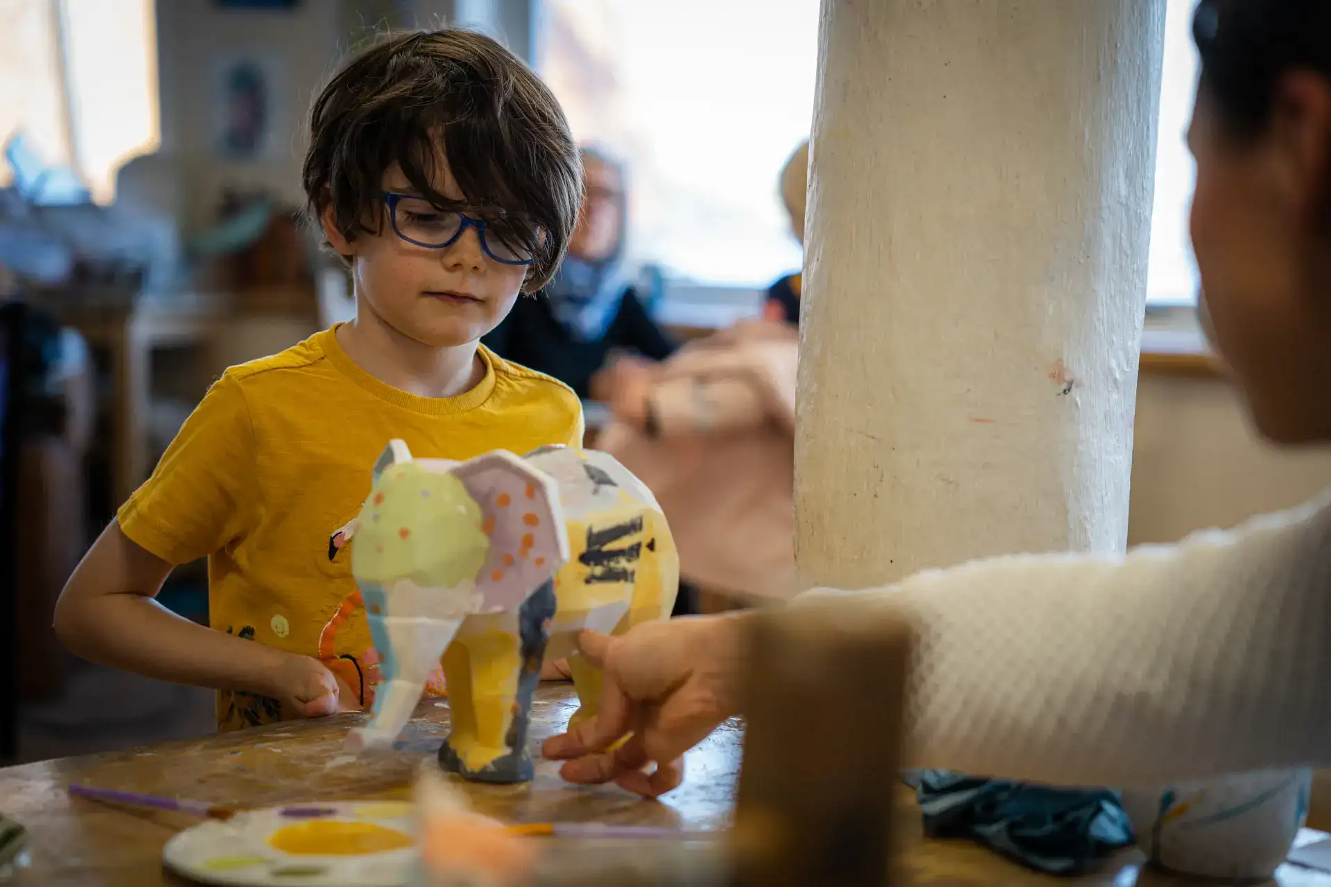 Background image - Boy Making Pottery at Honey Pot, South Queensferry